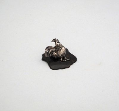 Appraisal: A George IV desk top paper clip of a cockerel