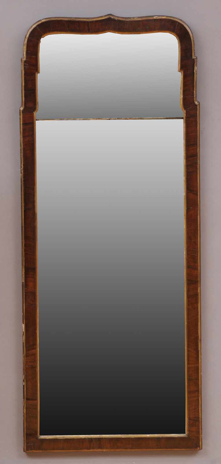 Appraisal: QUEEN ANNE WALNUT AND PARCEL-GILT PIER MIRROR The mirror plate