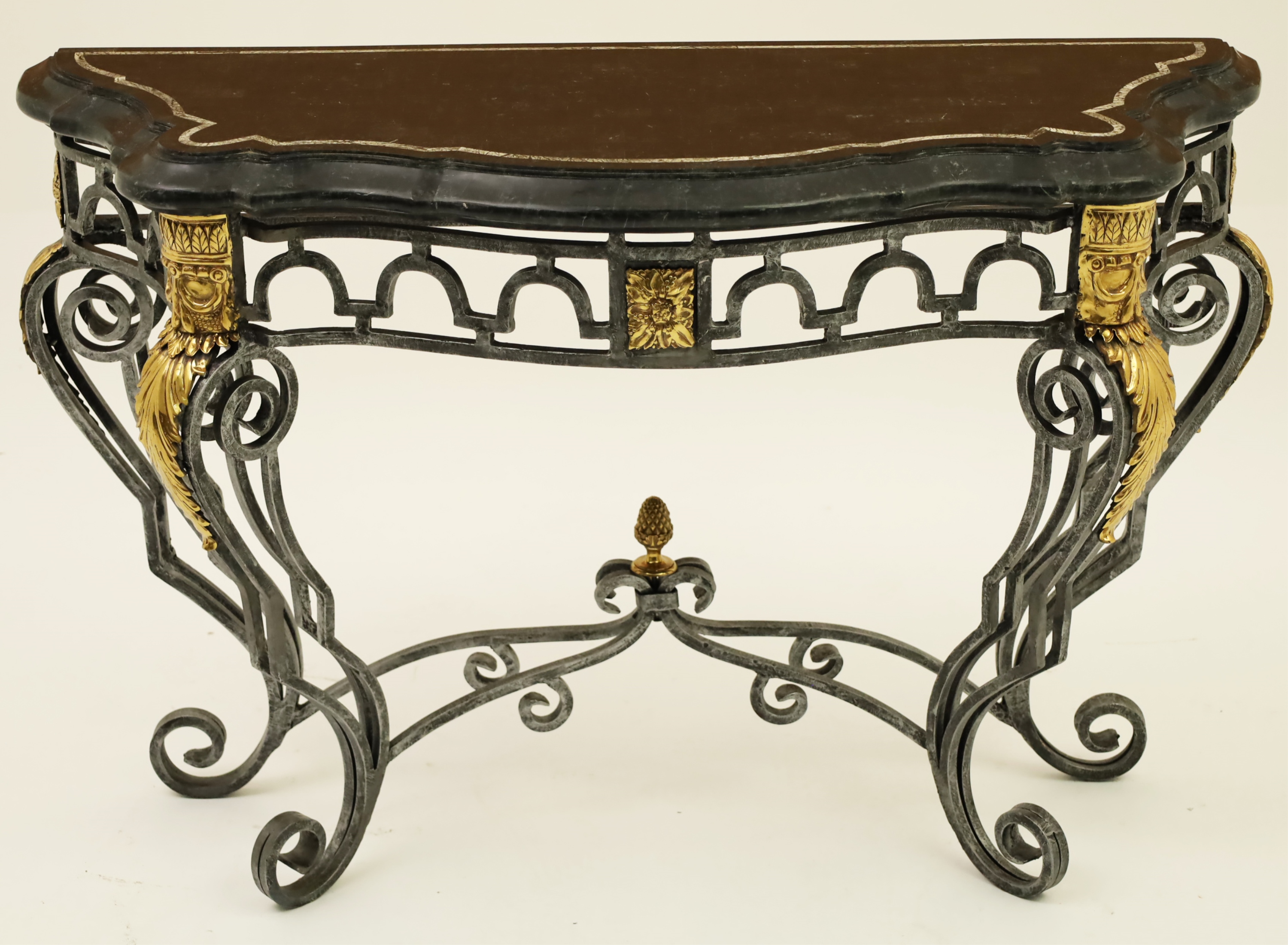 Appraisal: MAITLAND SMITH PEN SHELL TOP IRON CONSOLE Decorative serpentine formed