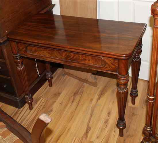 Appraisal: A mid th century French mahogany card table on turned