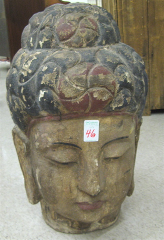 Appraisal: CHINESE CARVED AND PAINTED WOOD SCULPTURE the head of Buddha