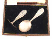 Appraisal: A boxed child's silver spoon and pusher Glasgow wt gm