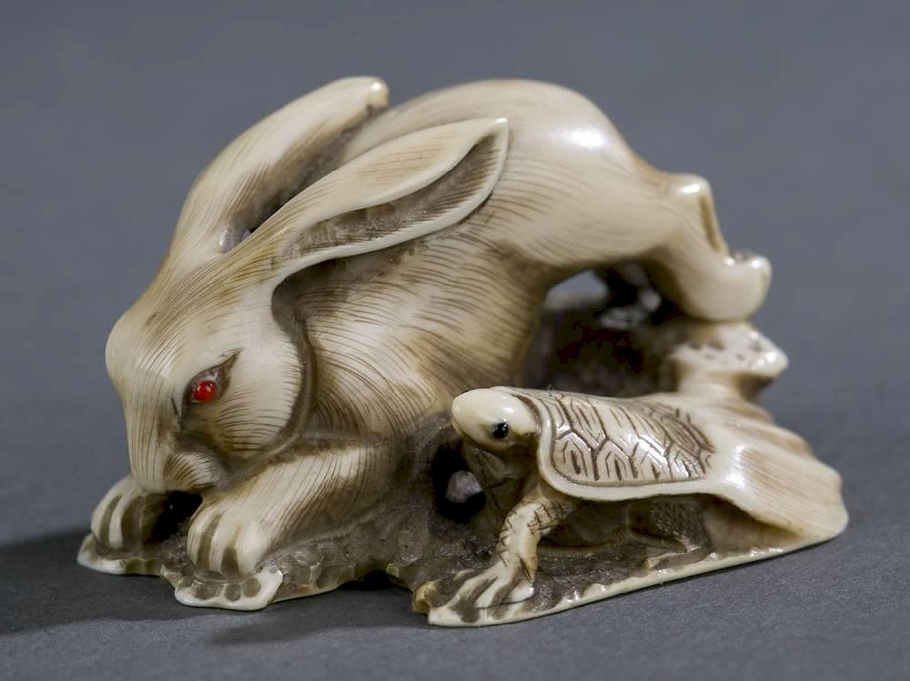 Appraisal: Three Japanese ivory animal netsuke c A group of three