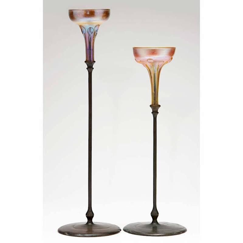 Appraisal: Two Tiffany Studios Bronze Candlesticks each with favrile glass candle