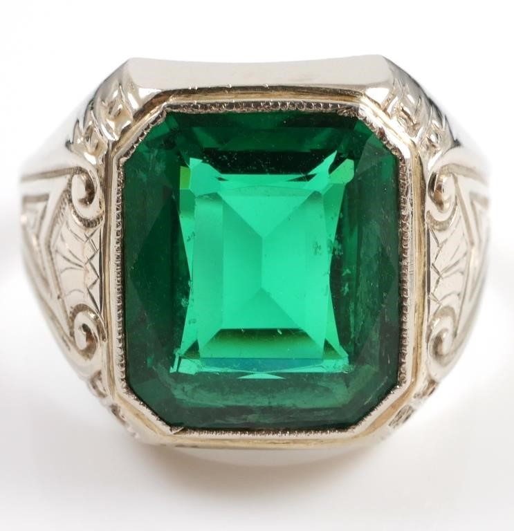 Appraisal: K white gold ring contains one emerald cut synthetic green