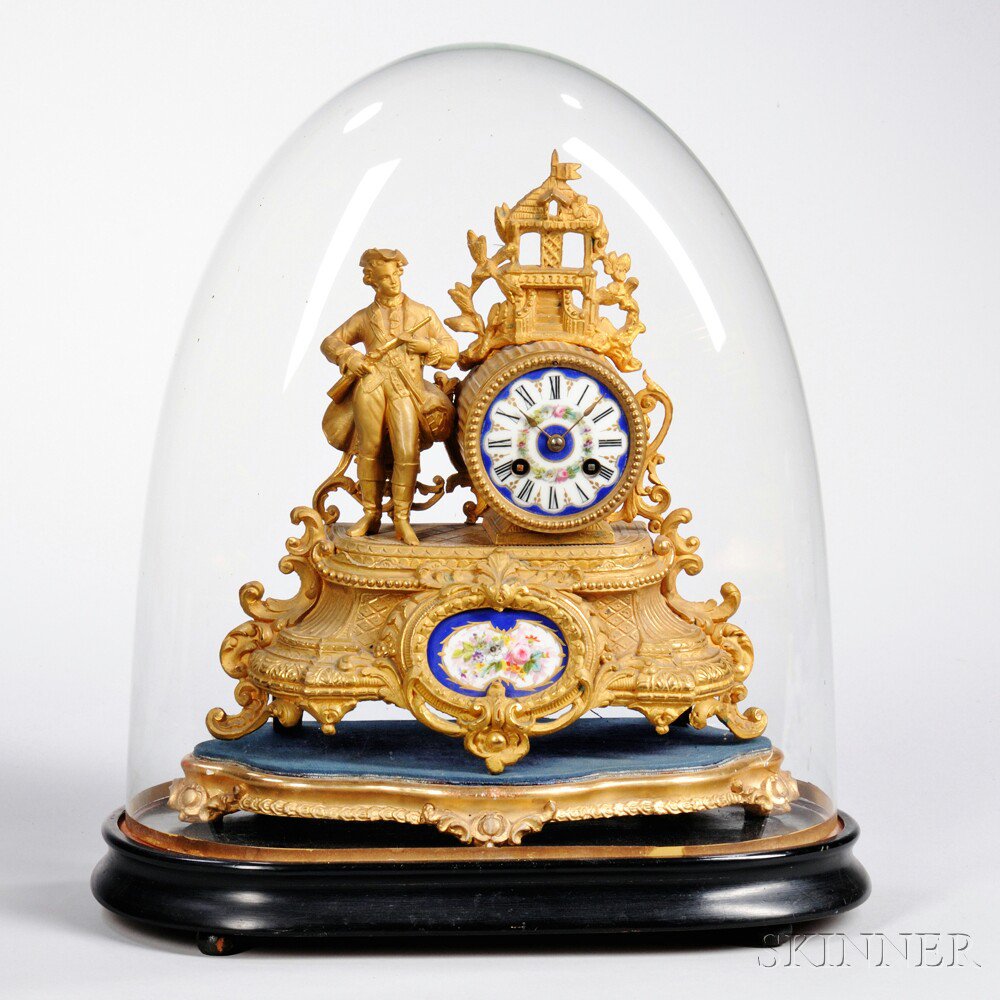 Appraisal: French Gilt Figural Clock c ornate raised plinth with a