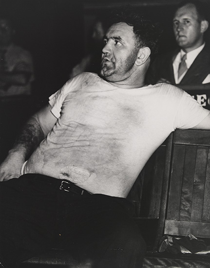 Appraisal: WEEGEE - Untitled Janitor watches rehearsal at the Yiddish Theater