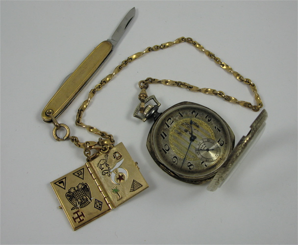 Appraisal: POCKET WATCH CHAIN POCKET KNIFE AND GOLD BOOK FOB The