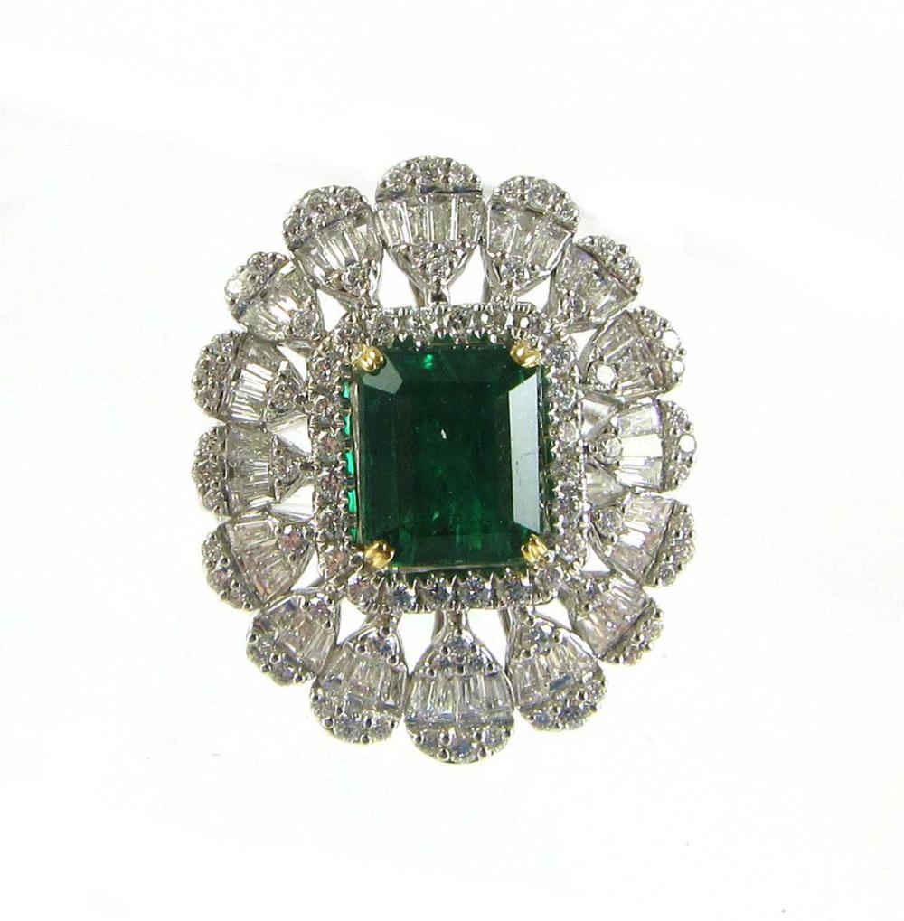 Appraisal: EMERALD AND DIAMOND COCKTAIL RING Emerald-cut green emerald cts Round-cut