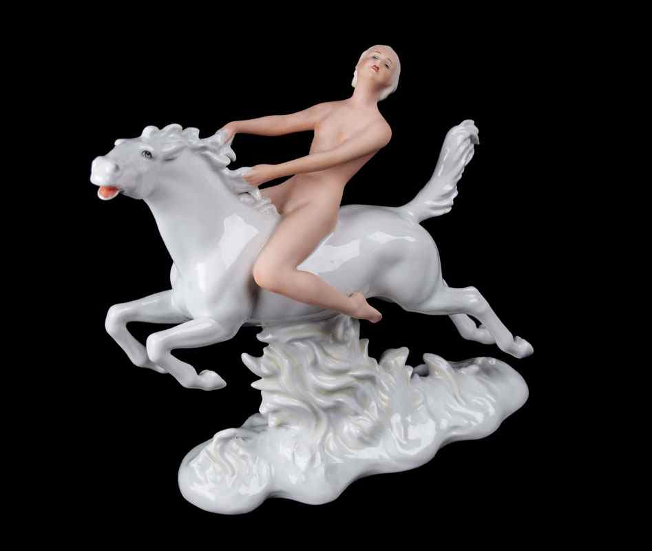 Appraisal: SCHAUBACH KUNST NUDE PORCELAIN FIGURE ON HORSE Figure of a