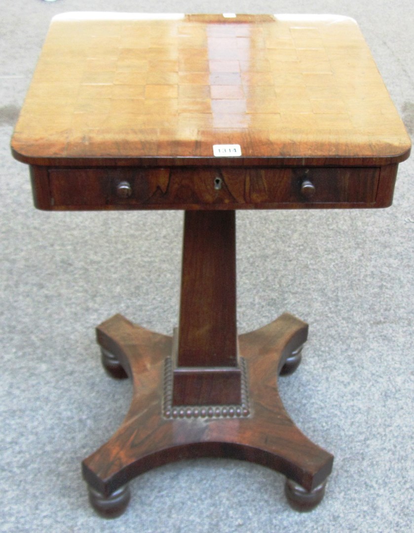 Appraisal: A William IV rosewood games table with chess board top