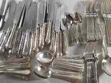 Appraisal: A canteen of plated flatware comprising twelve each table knives