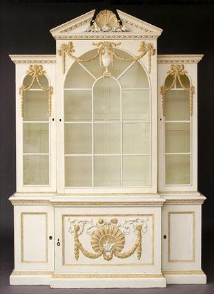 Appraisal: GEORGE III-STYLE PAINTED AND PARCEL-GILT DIMINUTIVE BREAKFRONT CABINET The arched