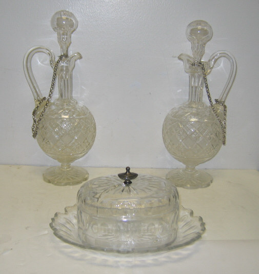 Appraisal: PAIR OF ANTIQUE ENGLISH GLASS EWERS AND BOX Each loop