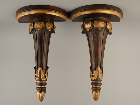 Appraisal: A Pair of Torch-form Wall Brackets wood and gilt finished