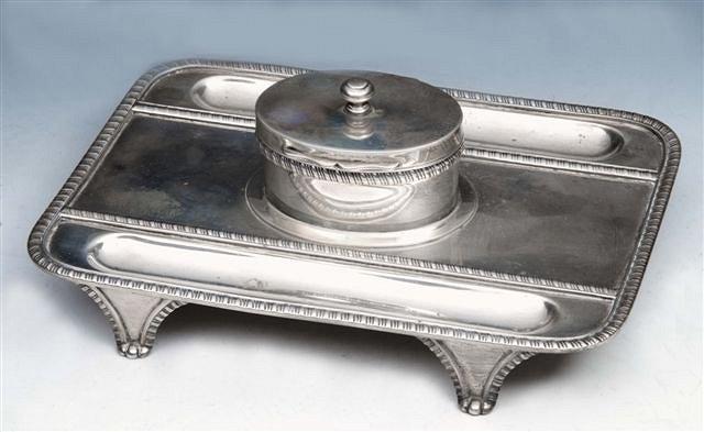 Appraisal: AN EDWARDIAN SILVER DESK STAND rectangular base with gadrooned border