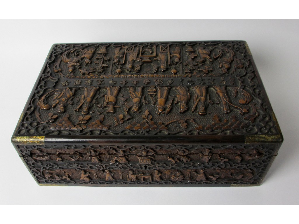 Appraisal: A Chinese export carved wood sewing box decorated all over