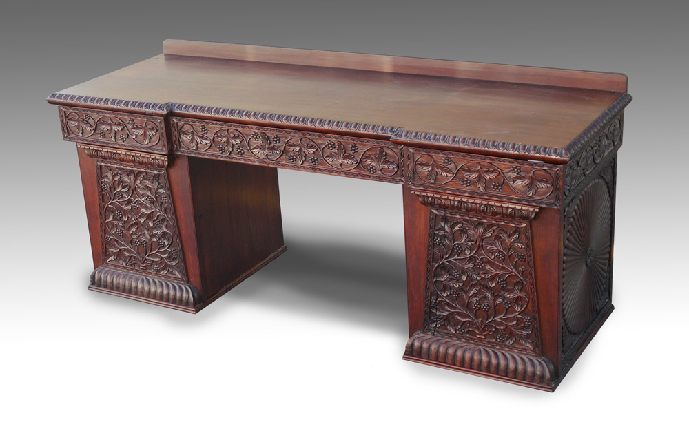 Appraisal: CARVED DOUBLE PEDESTAL DESK drawer top with egg and dart