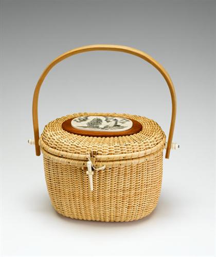 Appraisal: Nantucket basket purse With scrimshaw style oval medallion on domed