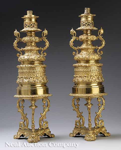 Appraisal: A Pair of Ornate Antique Gilt Brass Carcel Lamps in