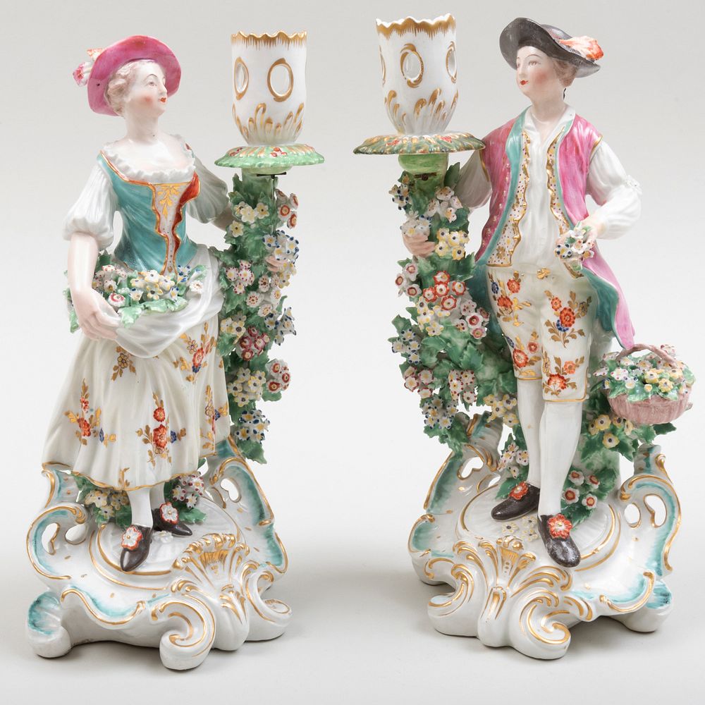 Appraisal: Pair of Chelsea-Derby Porcelain Figural Candlesticks of a Gardener and