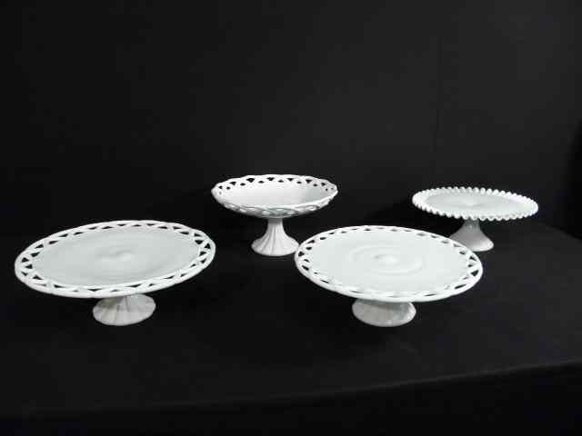 Appraisal: Lot of three milk glass cake stands and one milk