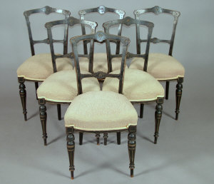 Appraisal: A set of six Edwardian ebonised and gilt dining chairs