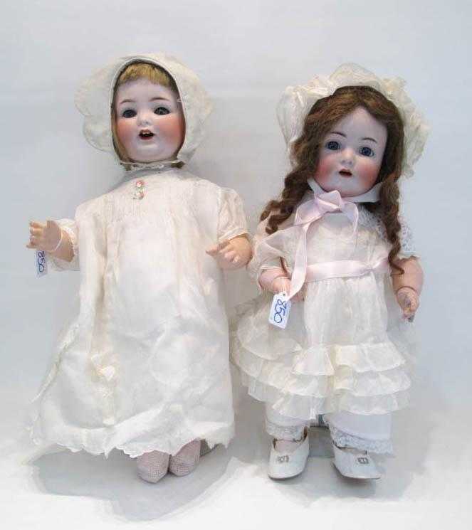 Appraisal: TWO GERMAN BISQUE HEAD CHARACTER DOLLS the blond doll marked