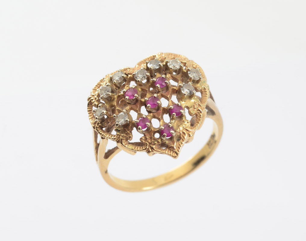 Appraisal: DIAMOND AND RUBY HEART SHAPED RING K yellow gold ring