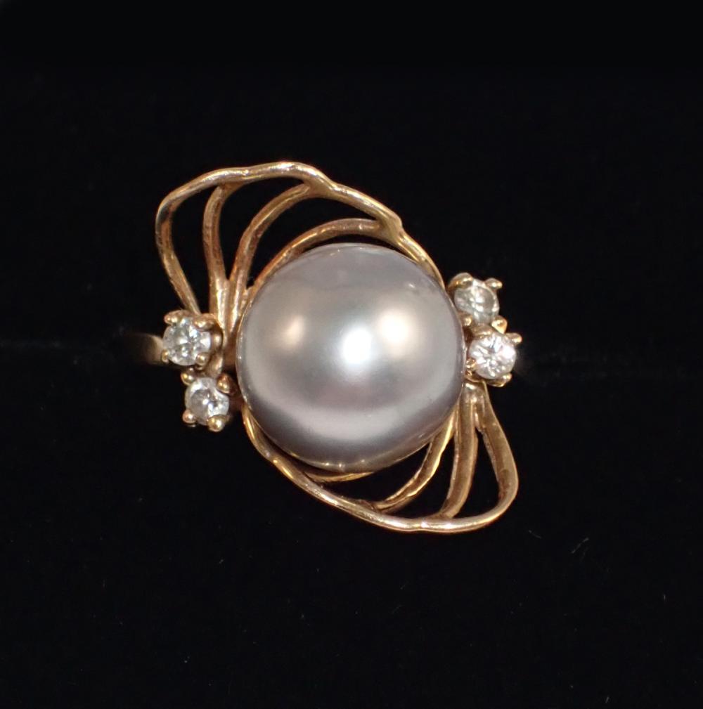 Appraisal: GREY PEARL DIAMOND AND FOURTEEN KARAT GOLD RING with four