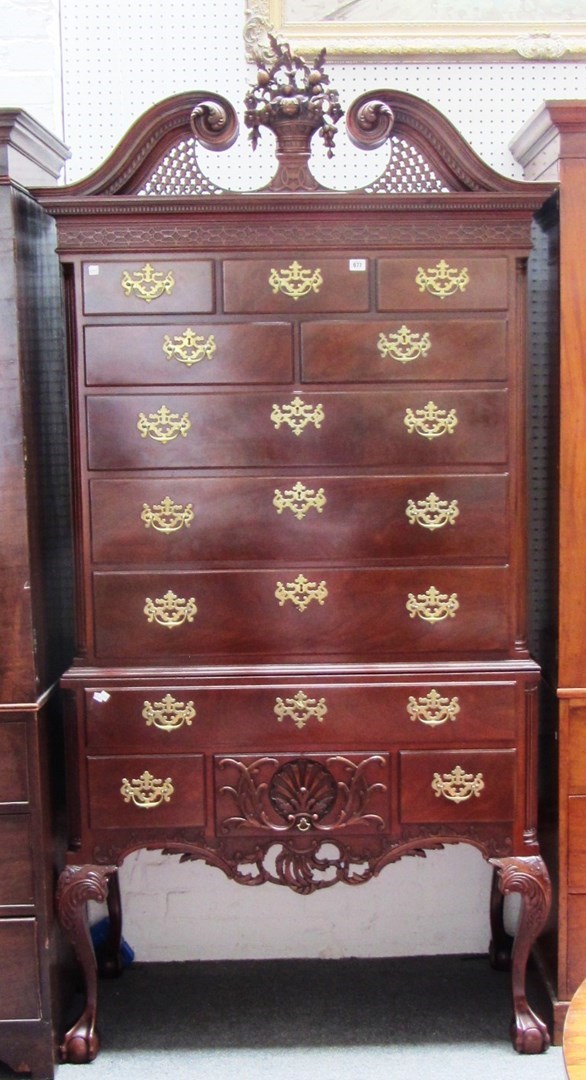 Appraisal: An American th century mahogany highboy the bonnet top over