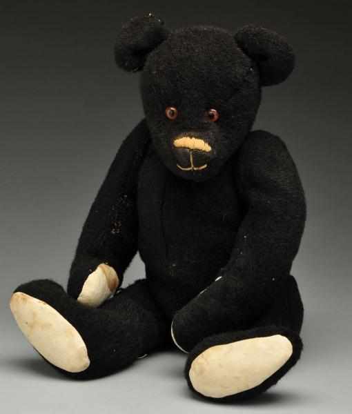 Appraisal: Black Wool American Bear Description Circa Leather pads glass eyes