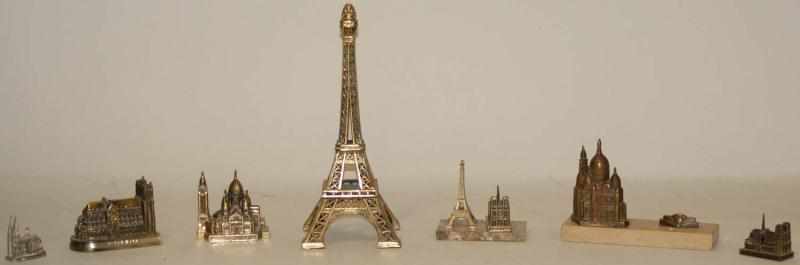 Appraisal: Lot of Metal French Buildings Paperweights of cathedrals and Eiffel