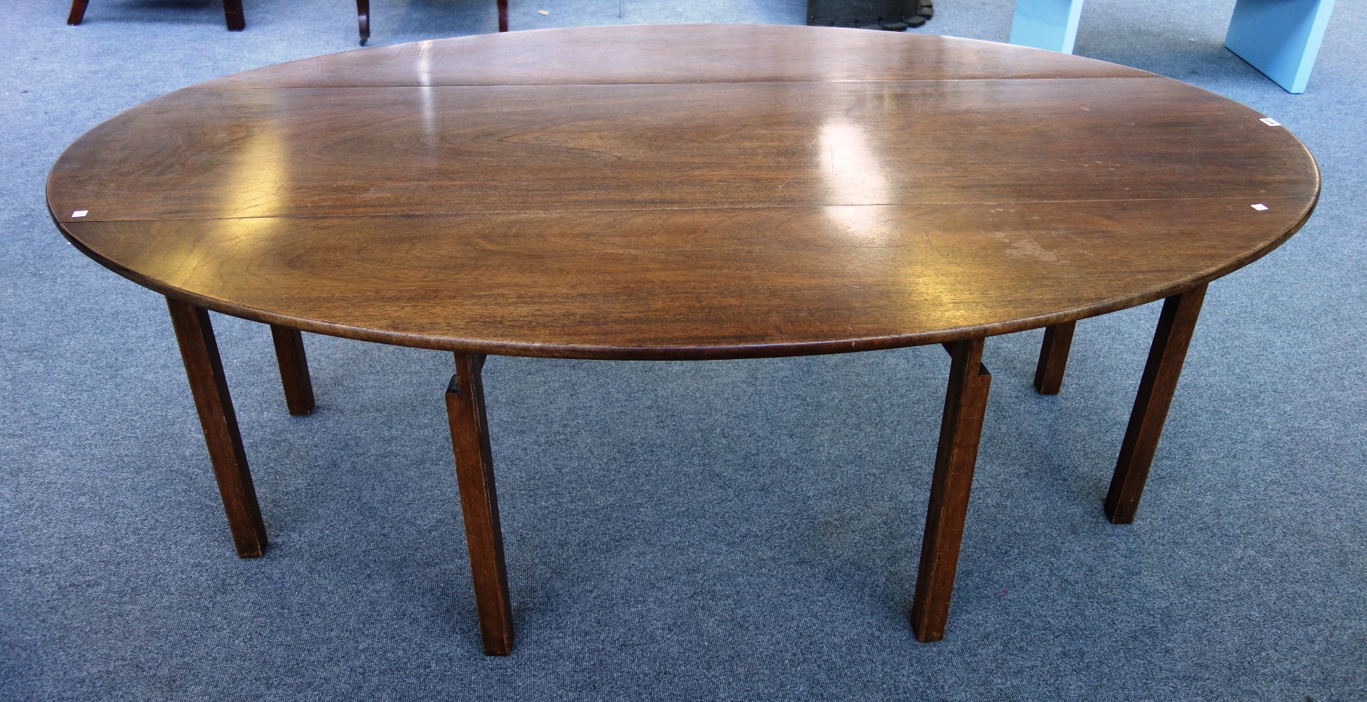 Appraisal: An th century style Irish mahogany drop flap wake table