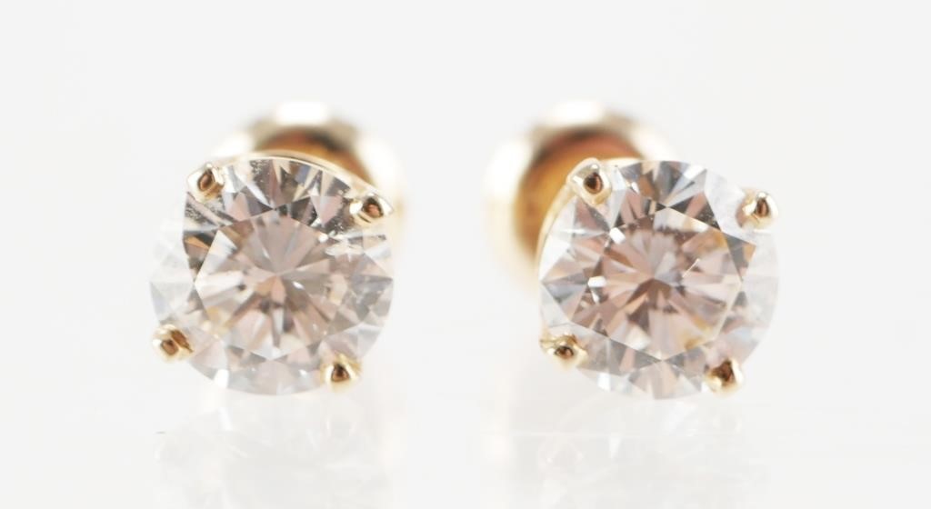 Appraisal: PAIR GOLD AND DIAMOND SOLITAIRE EARRINGS CTWPair K yellow gold