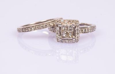 Appraisal: A diamond dress ring of square cluster shape with diamond