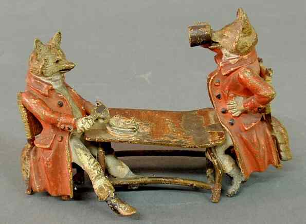 Appraisal: Austrian cold painted bronze figural group of foxes in foxhunting