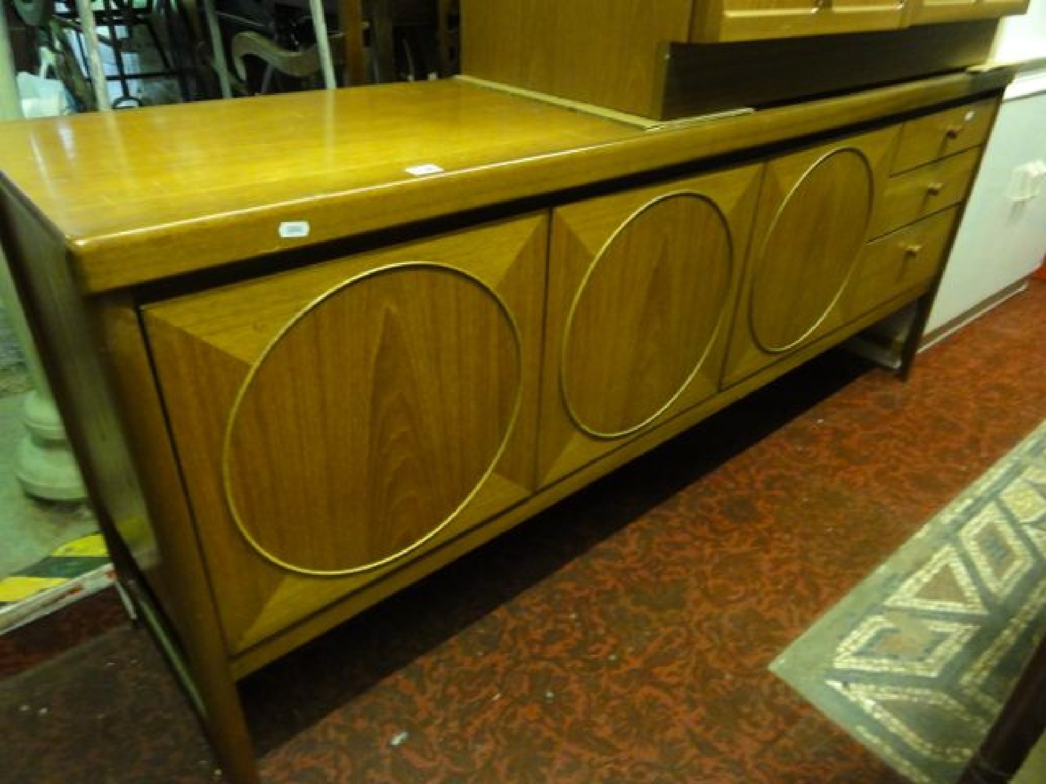 Appraisal: A Nathan mid th century low and long teak sideboard