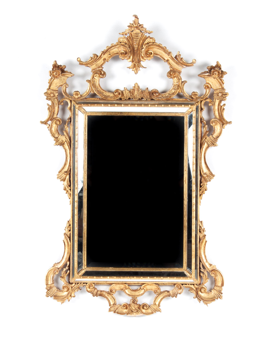 Appraisal: Chippendale style carved wood looking glass openworked foliated scrolled frame