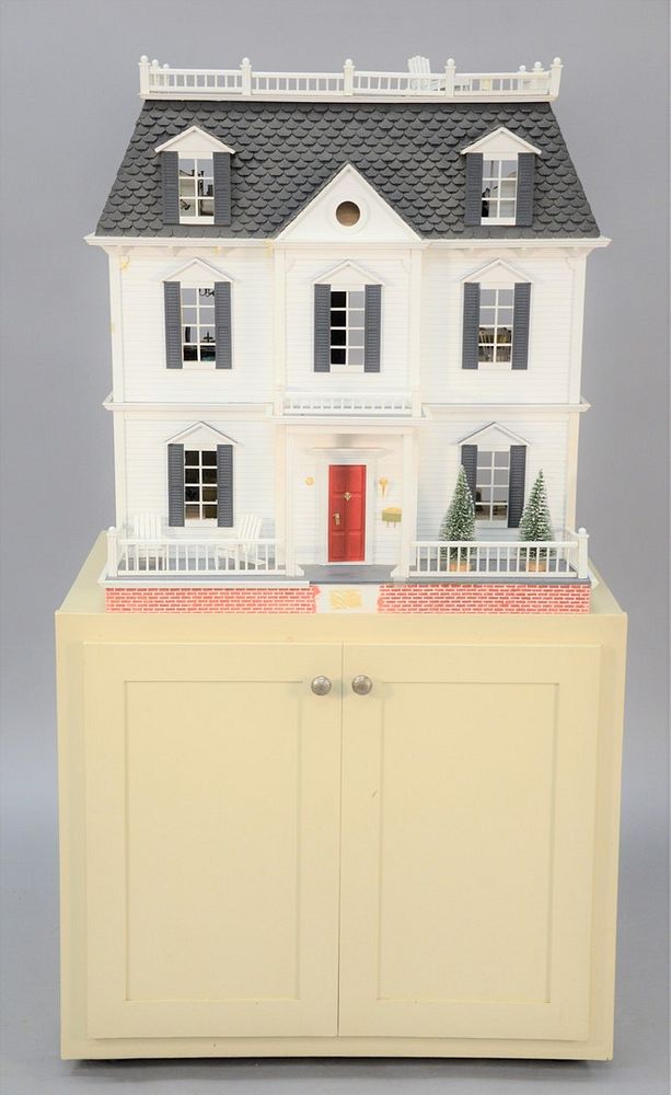 Appraisal: Dollhouse on base having two drawers along with miscellaneous figures