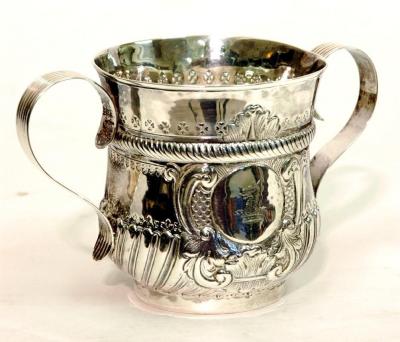 Appraisal: A GEORGE III LOVING CUP of waisted form with reeded