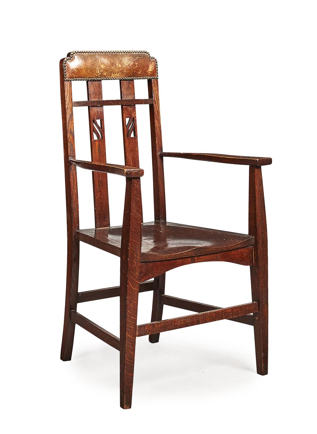 Appraisal: LIBERTY CO LONDON ARTS CRAFTS OAK ARMCHAIR CIRCA the leather