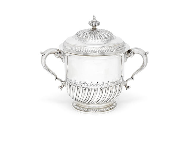 Appraisal: An Edwardian silver two handle cup and cover by Herbert