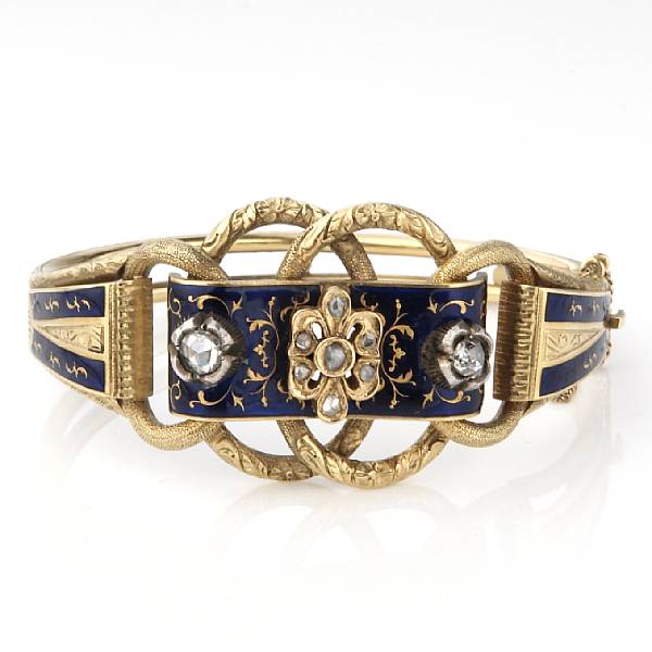 Appraisal: A diamond blue enamel and gold bangle diameter measures in