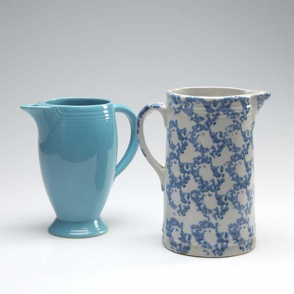 Appraisal: CERAMIC PITCHERS One blue Fiesta ware and blue and white