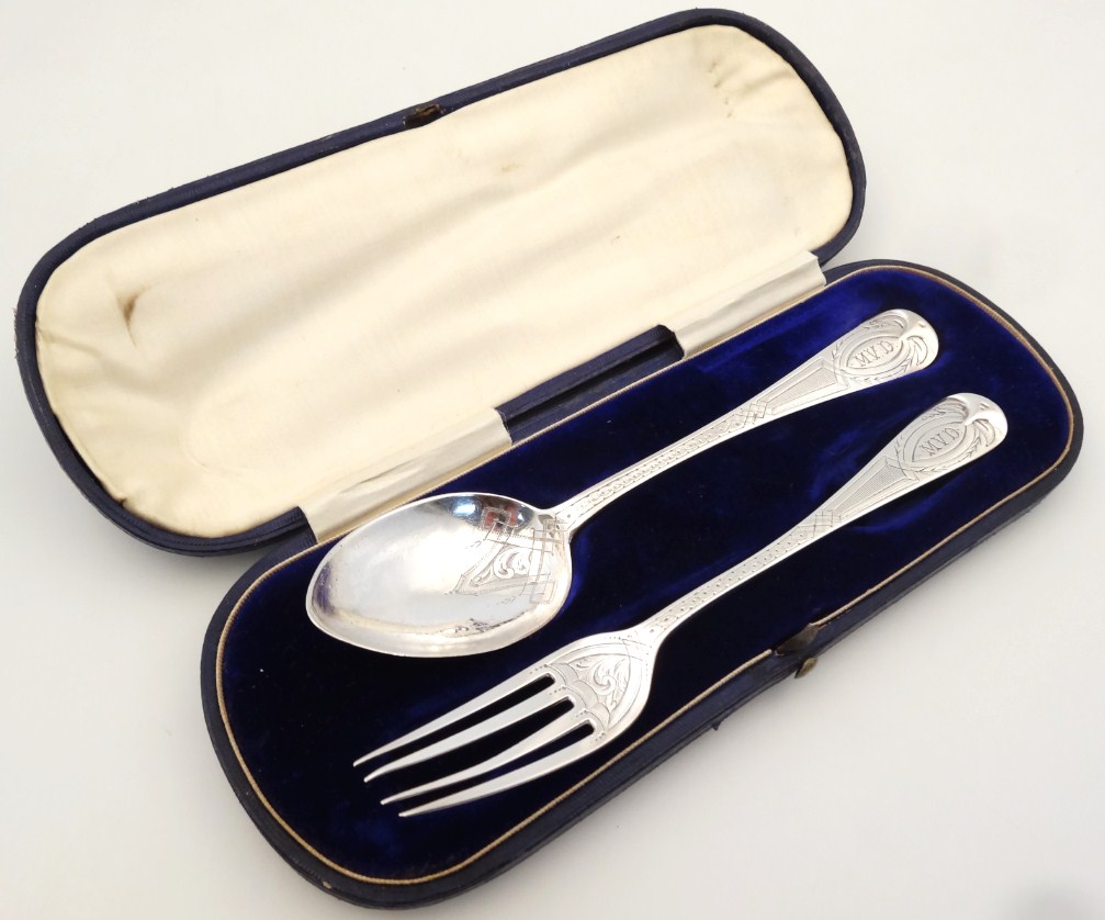 Appraisal: A Victorian Exeter silver christening set comprising spoon cm high