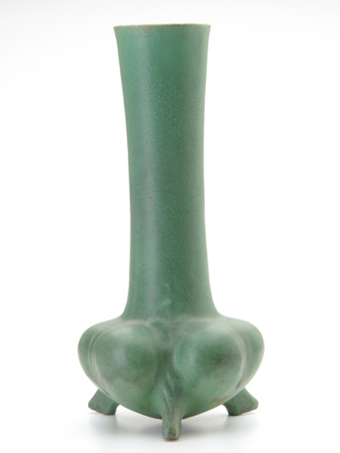 Appraisal: TECO Tall three-footed vase with lobed base covered in matte