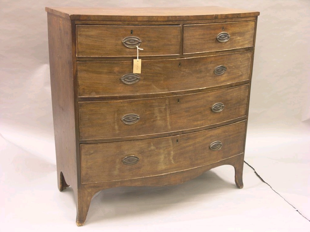 Appraisal: An early th century bow-fronted mahogany chest two short and