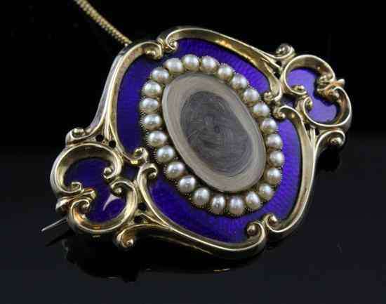 Appraisal: An early Victorian gold blue enamel and split pearl memorial