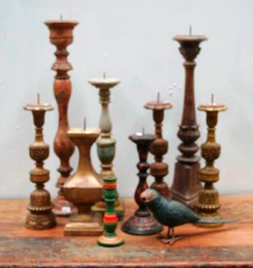 Appraisal: A group of nine th century carved wooden candlesticks together